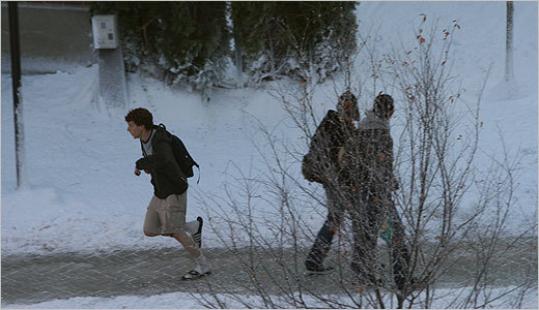 Jesse Eisenberg takes a run through fake snow on the set of 