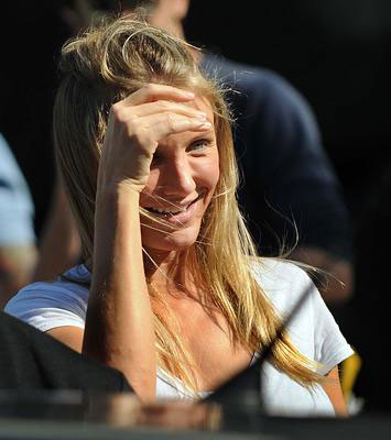 Cameron Diaz smiles trying to keep her hair from blowing in the wind while filming in Boston