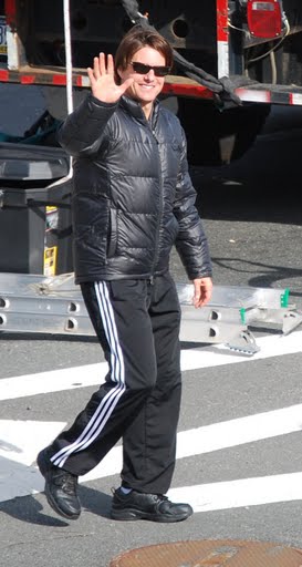 Tom Cruise waves to fans from the set of Wichita