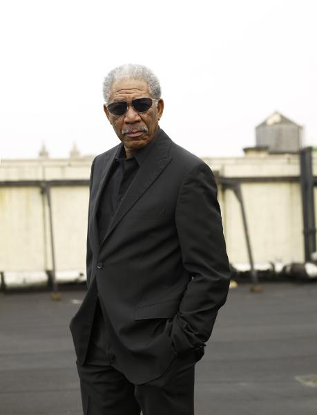 Morgan Freeman in black suit with sunglasses