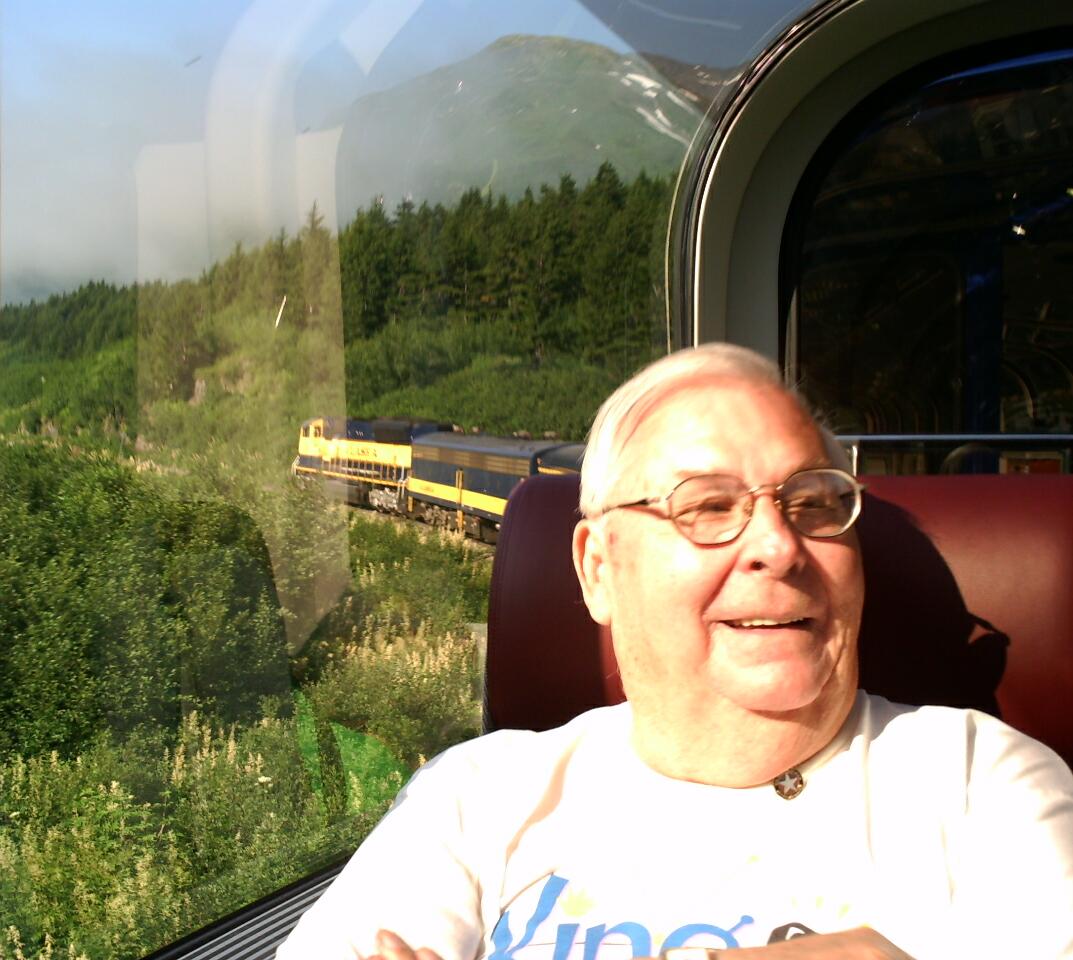 Alaska Railroad engine from inside Goldstar car over my dad's shoulder