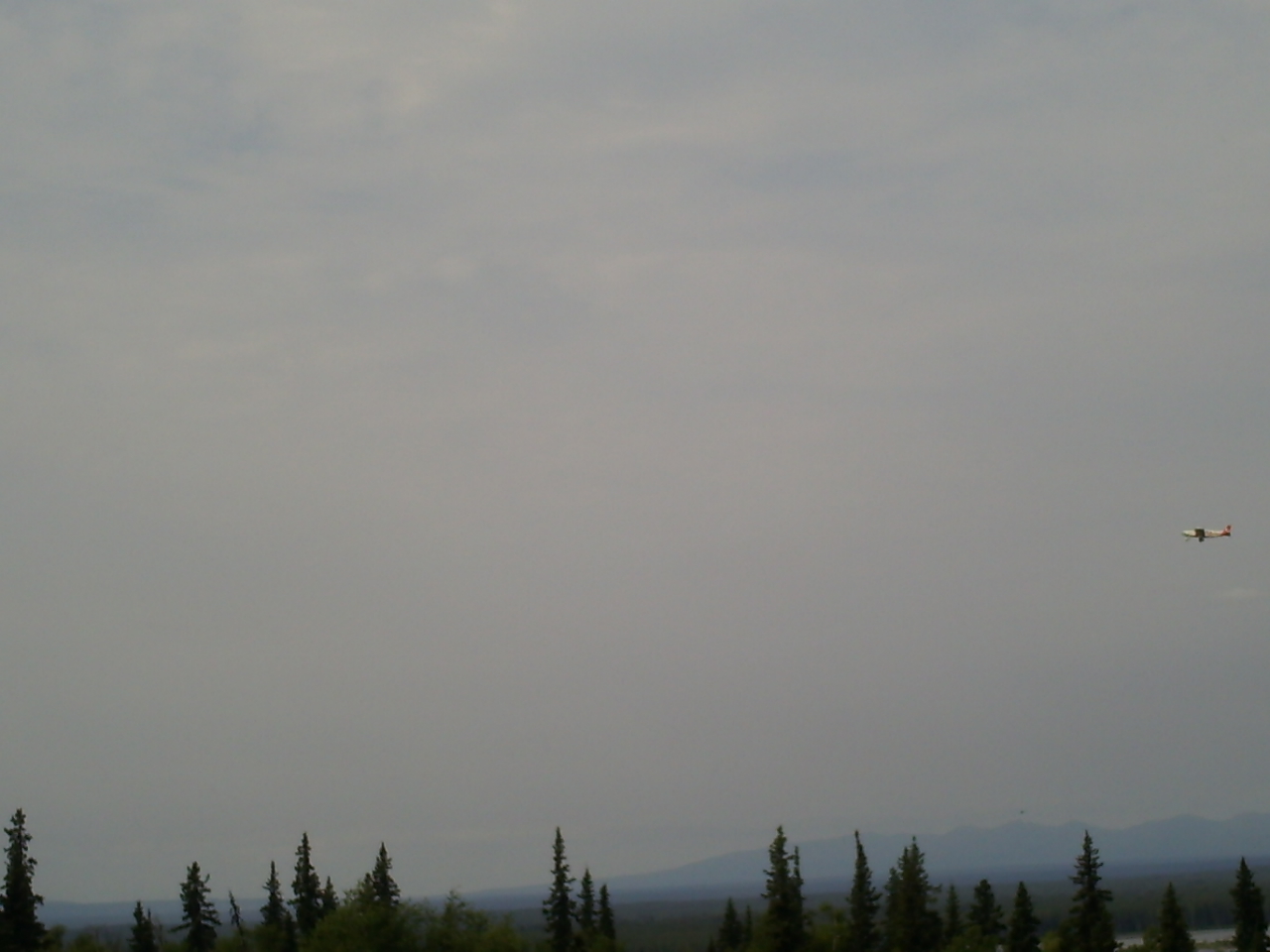 Plane taking off heading for Denali