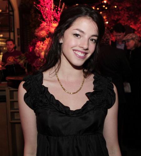 Olivia Thirlby smiles in a black dress