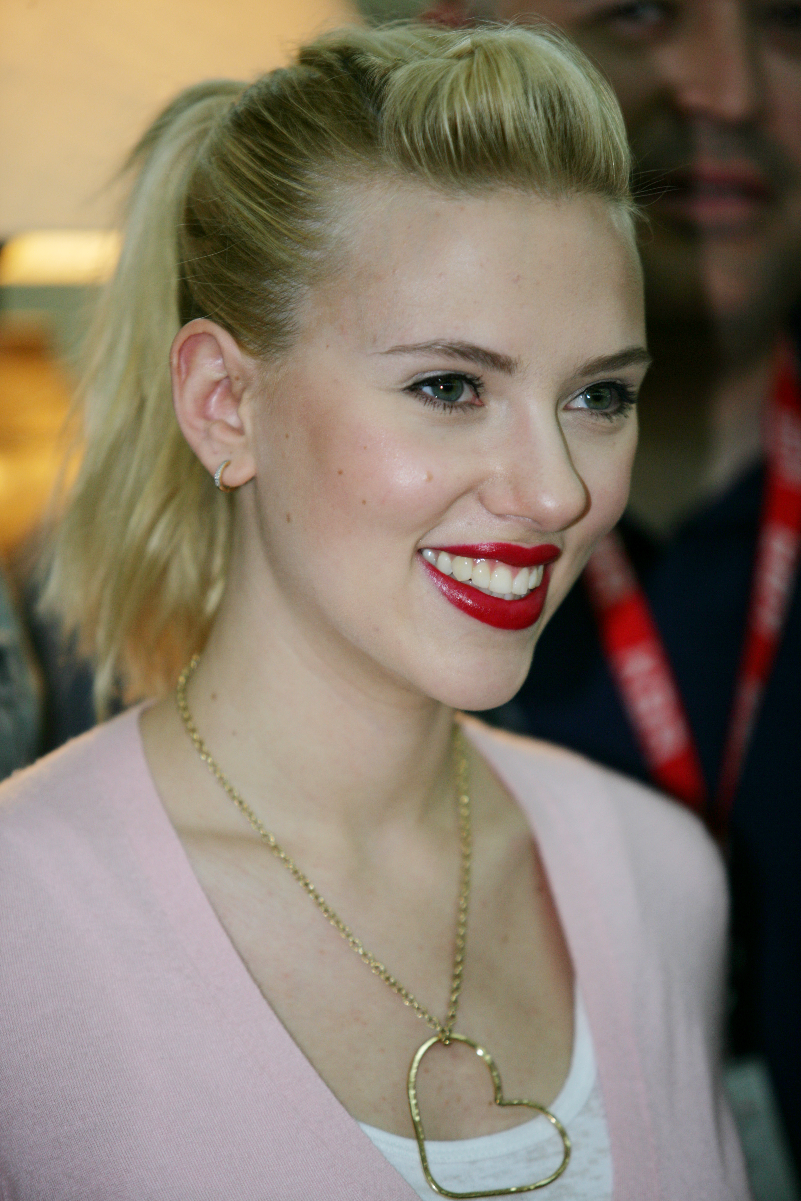 Scarlett Johansson - pink sweater and ponytail
