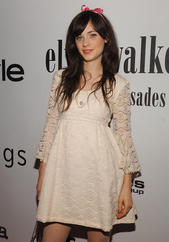 Zooey Deschanel looks oh so cute in white lace babydoll dress
