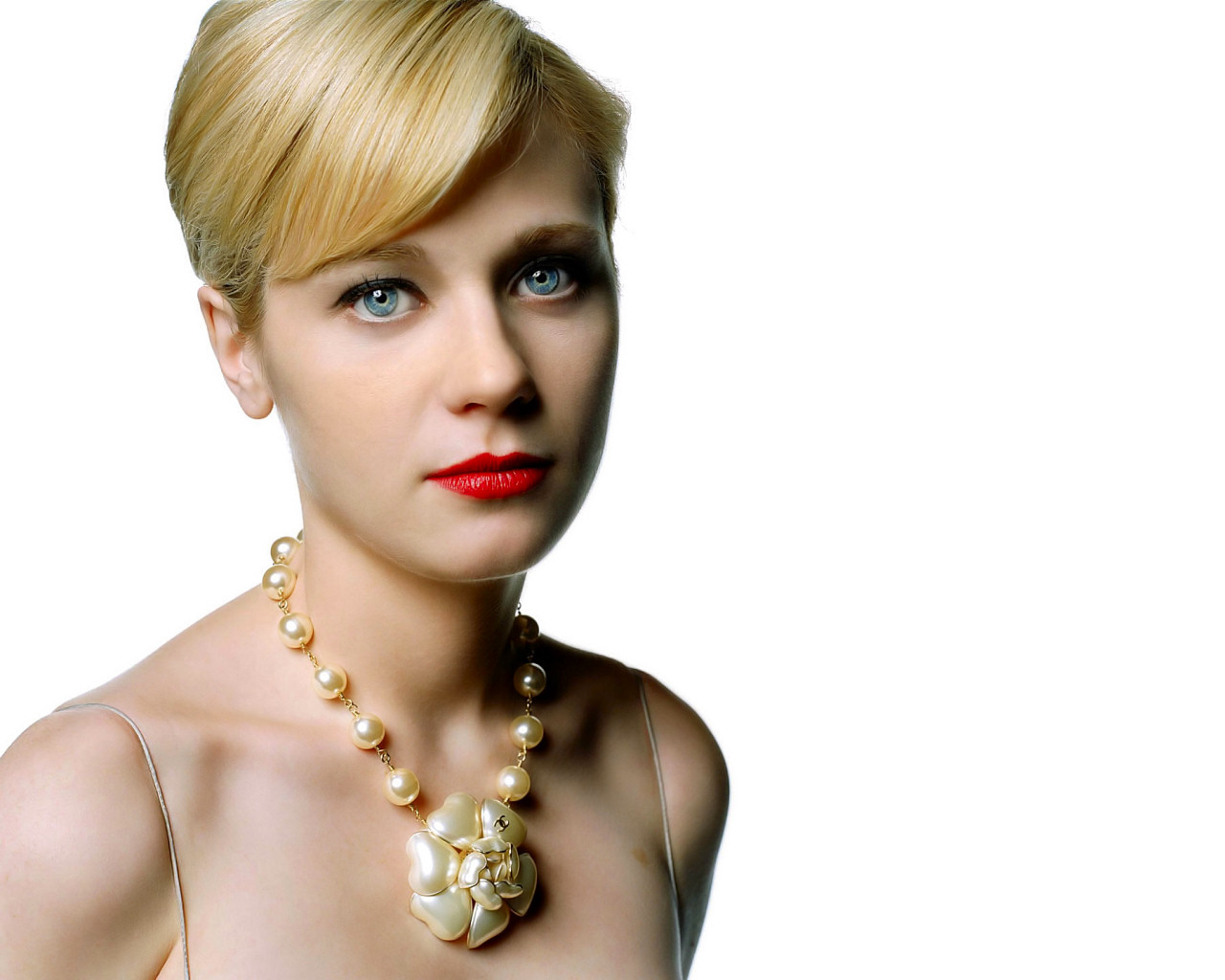Zooey Deschanel - shows off those gorgeous blue eyes in blonde hair and bright red lipstick