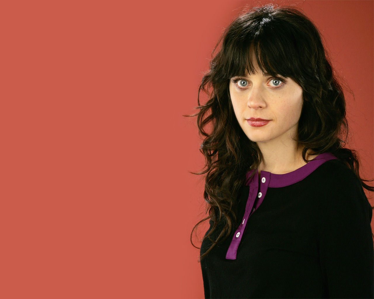 Zooey Deschanel - wallpaper - black sweater with purple collar