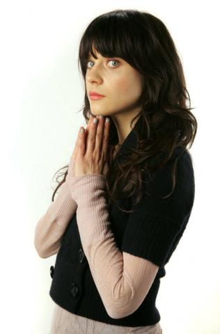 Zooey Deschanel peach sweater with black jacket