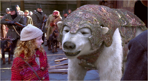 Dakota Blue Richards and Amoured Bear from The Golden Compass